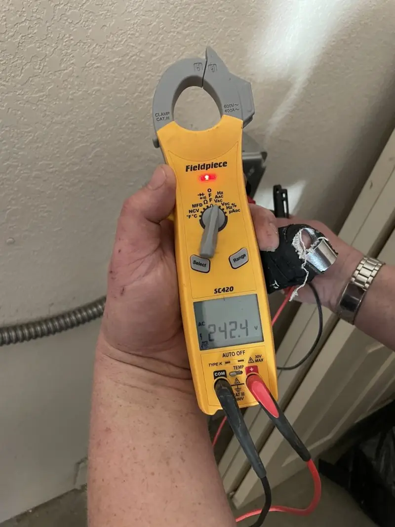 Voltage testing with clamp meter during Aluminum Wiring Replacement in Rowlett